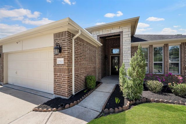 15623 Whisper Woods Drive, Cypress, TX 77429