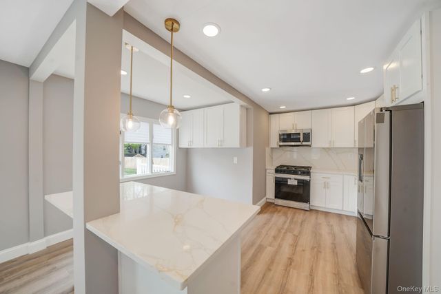 94 Rosemary Lane, Centereach, NY 11720