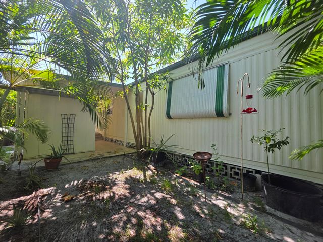 6125 N Guava Lane, Atlantis, FL 33462
