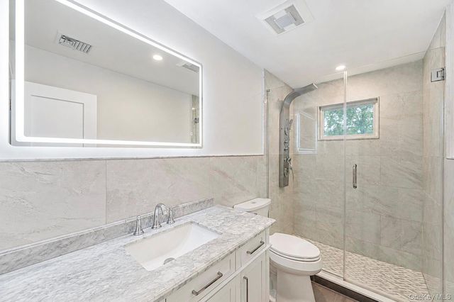 15 Dillon Drive, Dix Hills, NY 11746