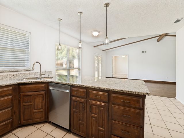 702 Woodcrest Drive, Grand Prairie, TX 75052