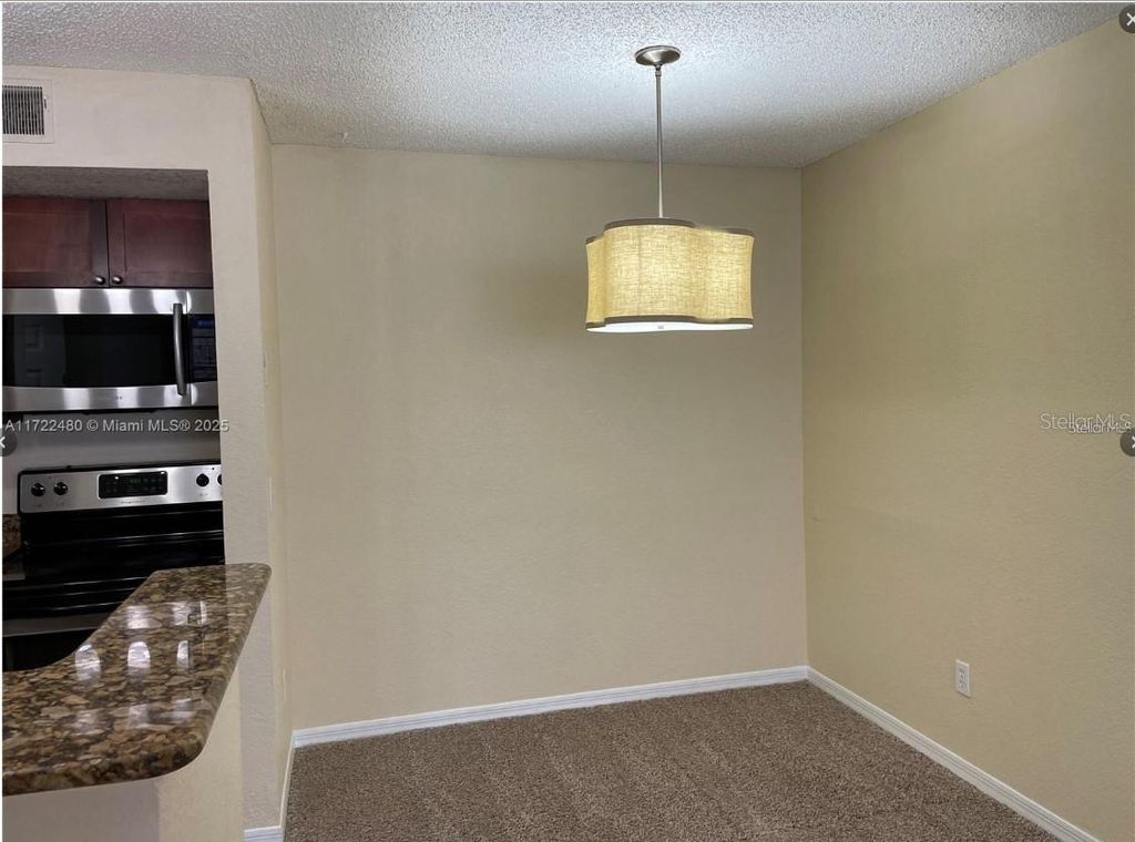 Image 6 of property listing at 5160 CONROY ROAD 14, Orlando, FL 32811