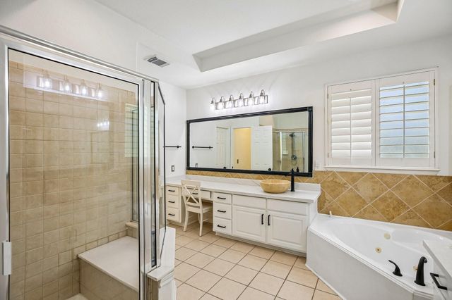 14 Guinevere Place, The Woodlands, TX 77384