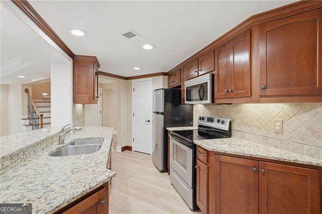 6185 Masters Club Drive, Suwanee, GA 30024