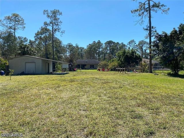 5121 Teak Wood DR, Naples, FL 34119