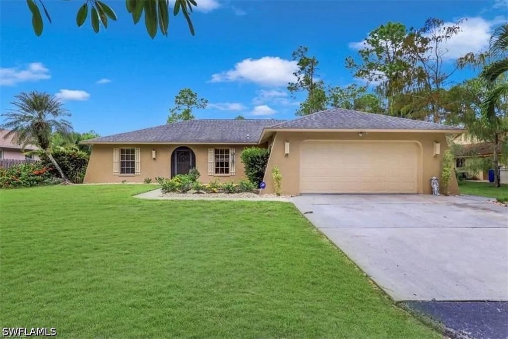 5121 Teak Wood DR, Naples, FL 34119