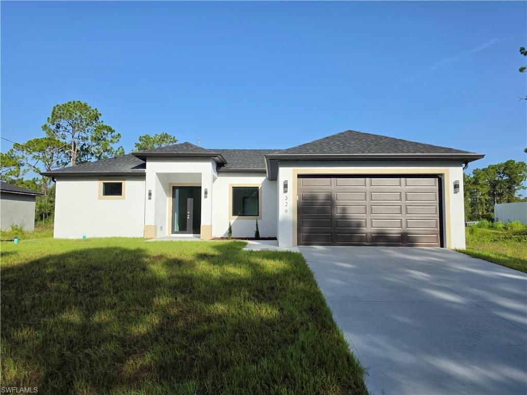 326 NATHAN AVE, LEHIGH ACRES, FL 33974 — exterior