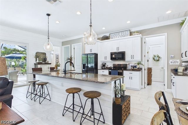 437 NW 38th PL, Cape Coral, FL 33993