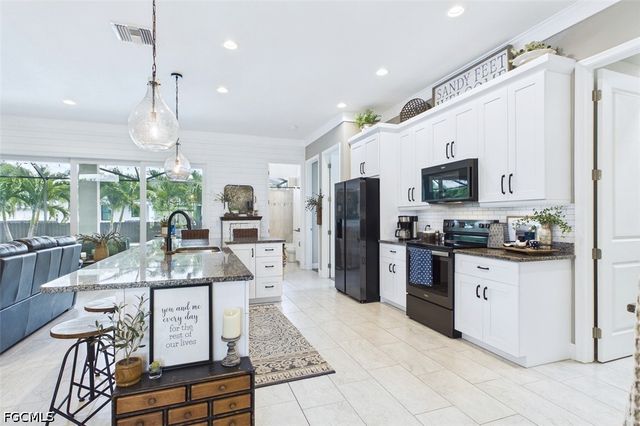 437 NW 38th PL, Cape Coral, FL 33993