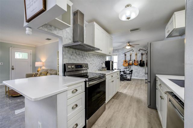 1472 QUEEN ANNE DRIVE, Palm Harbor, FL 34684