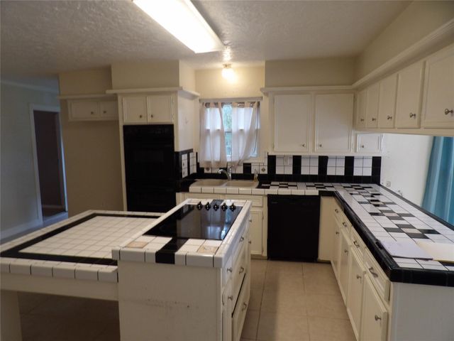 26527 Bayou Tesch Drive, Magnolia, TX 77354