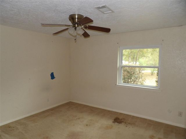 26527 Bayou Tesch Drive, Magnolia, TX 77354