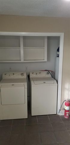 9537 Braeburn Glen Boulevard, Houston, TX 77074