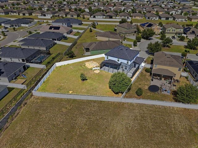 9012 ORANGE BLOSSOM Loop, Haines City, FL 33844