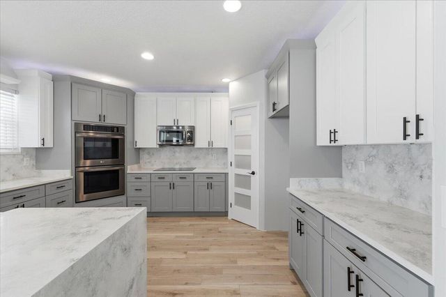 9012 ORANGE BLOSSOM Loop, Haines City, FL 33844