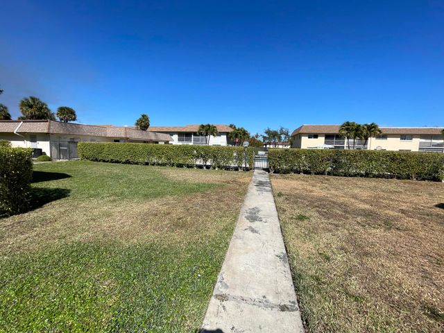 9911 Sandalfoot Boulevard 112, Boca Raton, FL 33428