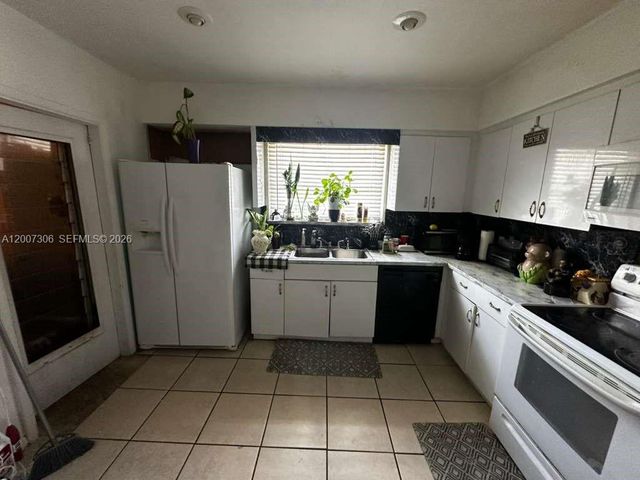 15 NW 88th St, El Portal, FL 33150