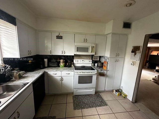 15 NW 88th St, El Portal, FL 33150