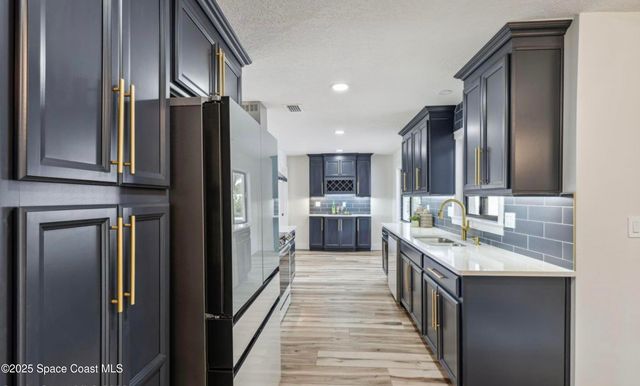 1190 Yacht Club Blvd, Indian Harbour Beach, FL 32937