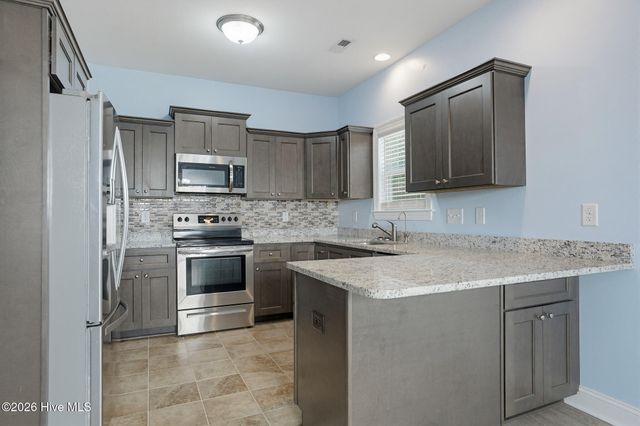 211 Derby Downs Drive, Sneads Ferry, NC 28460