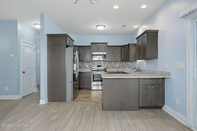 211 Derby Downs Drive, Sneads Ferry, NC 28460
