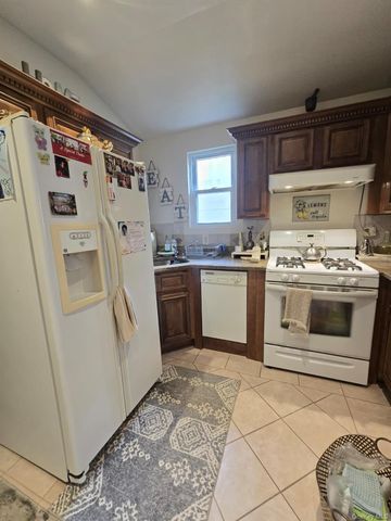 9734 86th Street, Ozone Park, NY 11416