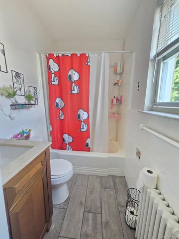 9734 86th Street, Ozone Park, NY 11416