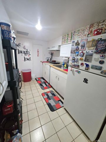 9734 86th Street, Ozone Park, NY 11416