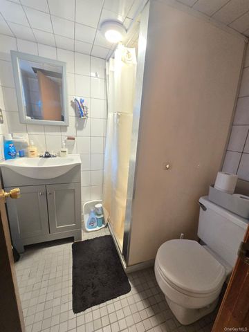 9734 86th Street, Ozone Park, NY 11416
