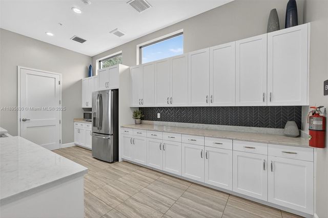 1310 Whitcombe Dr, Royal Palm Beach, FL 33411