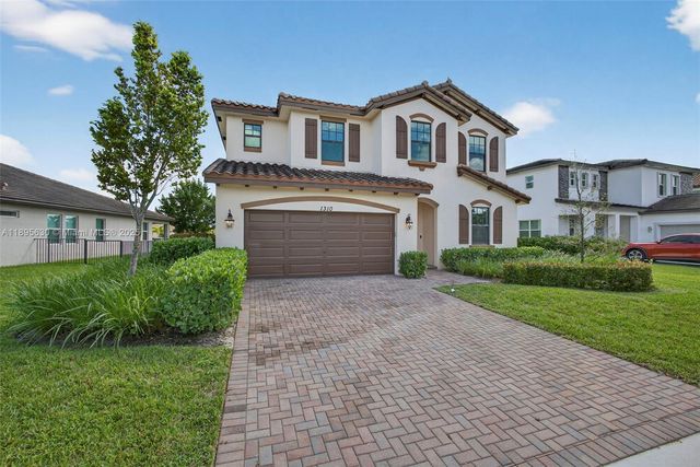1310 Whitcombe Dr, Royal Palm Beach, FL 33411