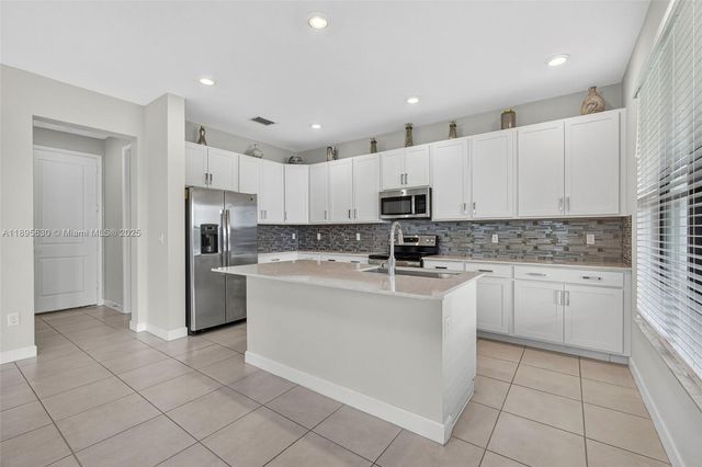 1310 Whitcombe Dr, Royal Palm Beach, FL 33411