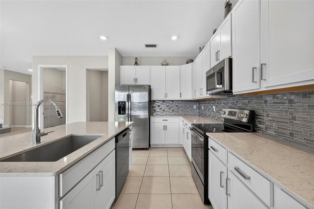 1310 Whitcombe Dr, Royal Palm Beach, FL 33411