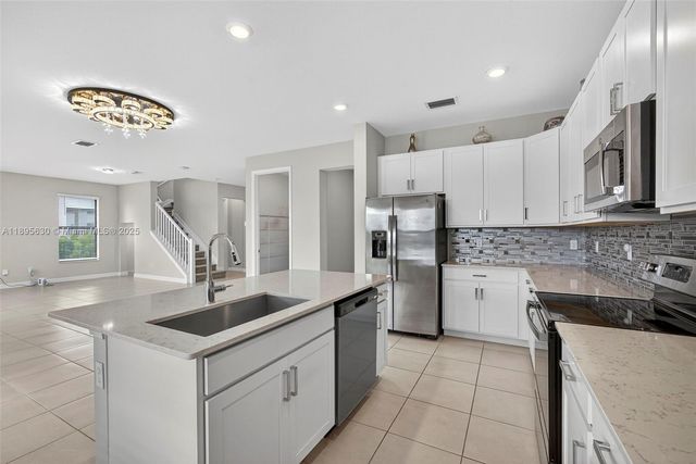 1310 Whitcombe Dr, Royal Palm Beach, FL 33411