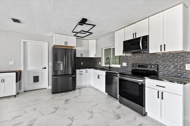 1436 MARDRAKE ROAD, Daytona Beach, FL 32114