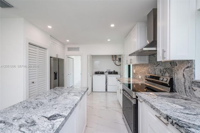 1621 S Treasure Dr, North Bay Village, FL 33141