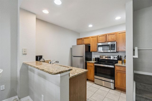 4560 YELLOWGOLD ROAD E 103, Kissimmee, FL 34746