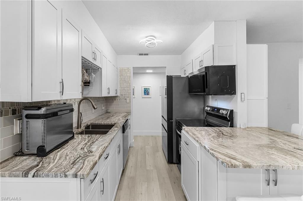 Image 6 of property listing at 3905 Del Prado BLVD S # 101, Cape Coral, FL 33904