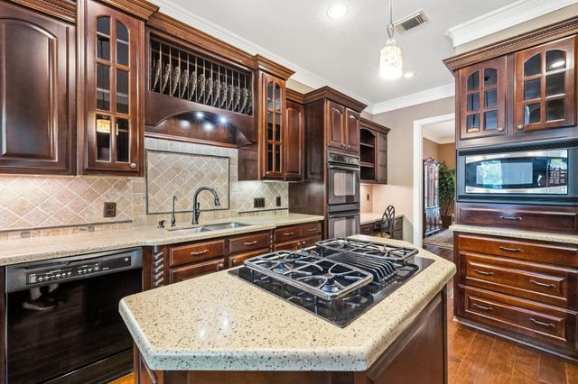 6110 Country Falls Lane, Kingwood, TX 77345