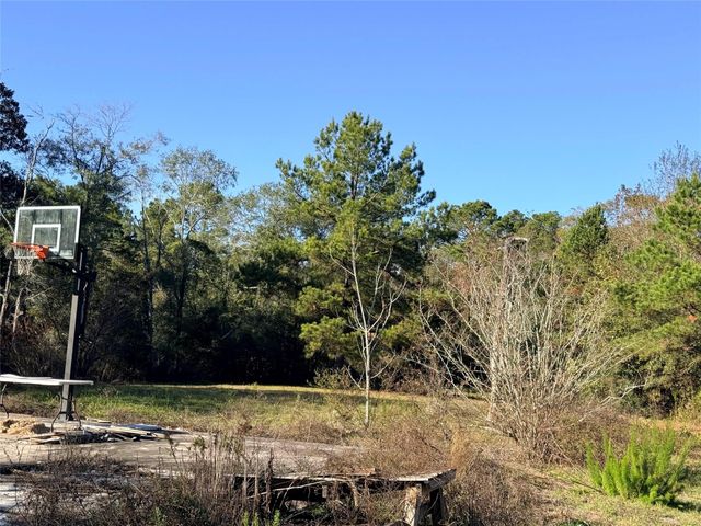 719 County Rd 3880, Cleveland, TX 77328