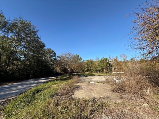 719 County Rd 3880, Cleveland, TX 77328