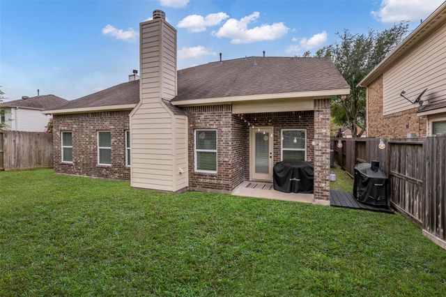 22118 Field Green Drive, Cypress, TX 77433