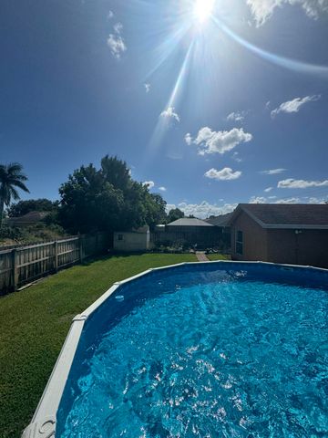 591 NW GRENADA Street, Port St. Lucie, Port St Lucie, FL 34983