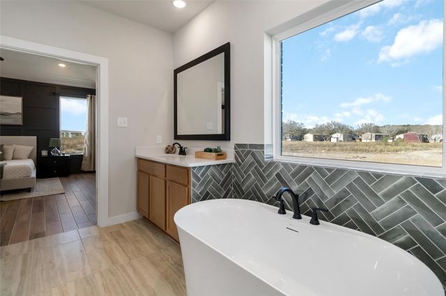 180 Barton Place Drive, Tarkington, TX 77327