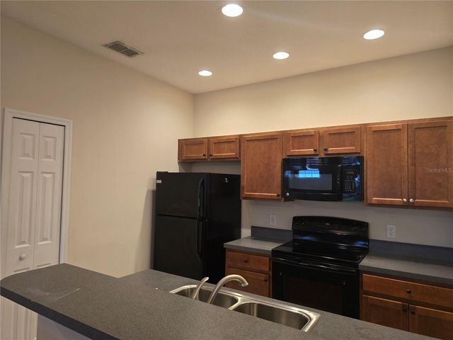1852 CORIANDER DR, Poinciana, FL 34759