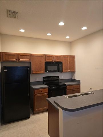 1852 CORIANDER DR, Poinciana, FL 34759