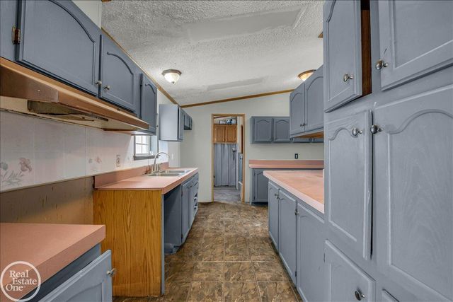 7677 Hewitt Road, Greenwood Twp, MI 48006