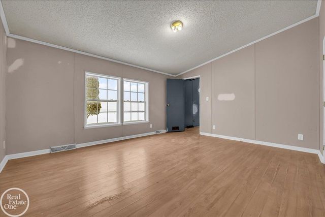 7677 Hewitt Road, Greenwood Twp, MI 48006