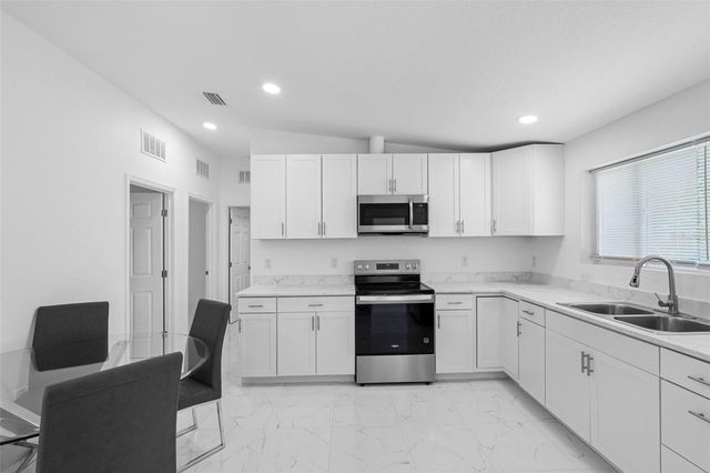 6847 WOODSMAN DRIVE, Wesley Chapel, FL 33544