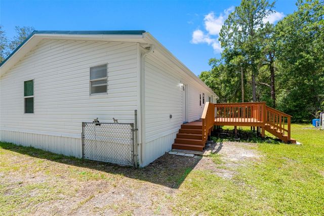 6847 WOODSMAN DRIVE, Wesley Chapel, FL 33544